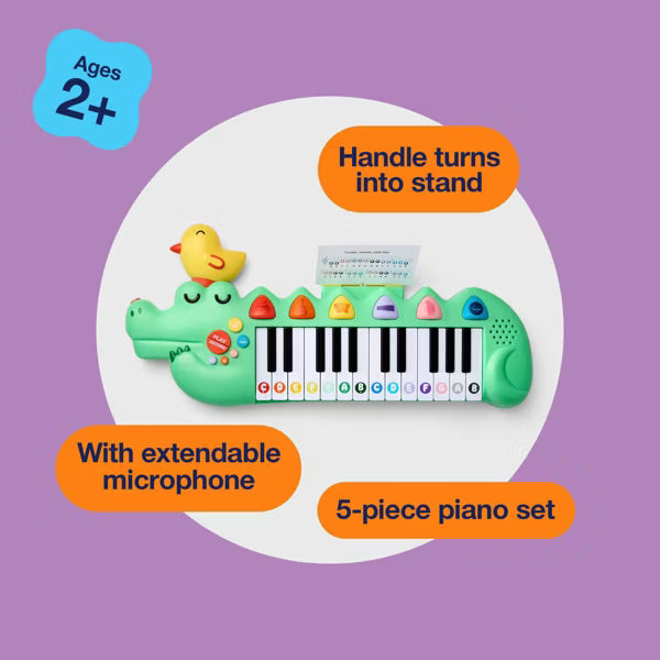 Piano electrónico portátil en forma de cocodrilo