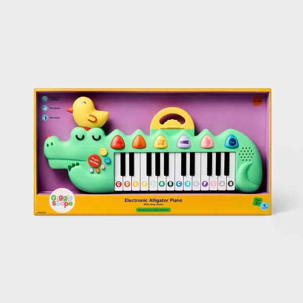 Piano electrónico portátil en forma de cocodrilo