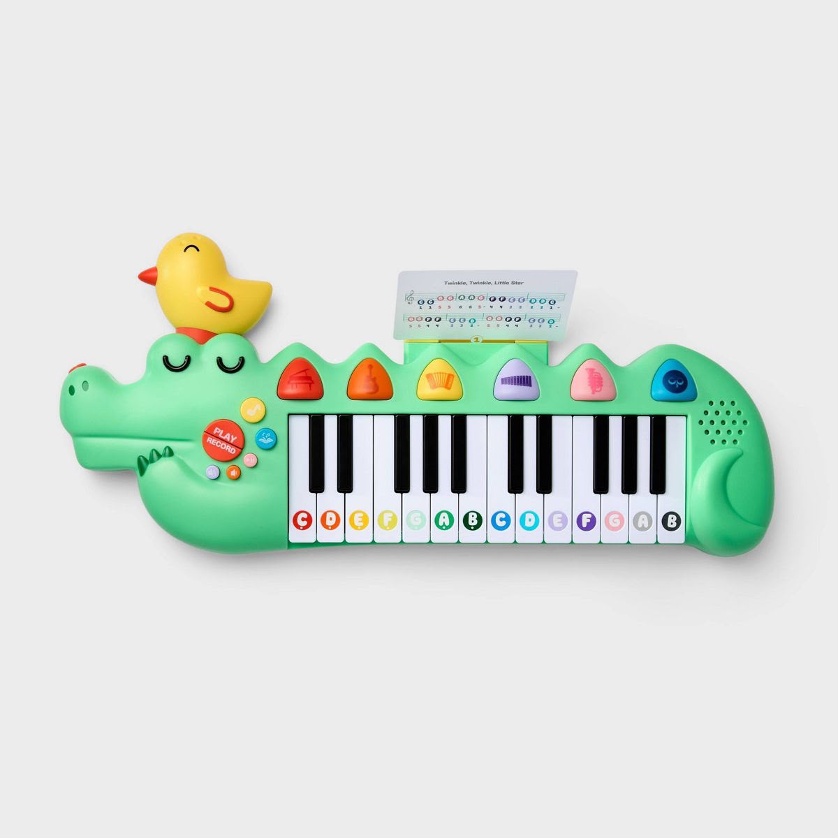 Piano electrónico portátil en forma de cocodrilo