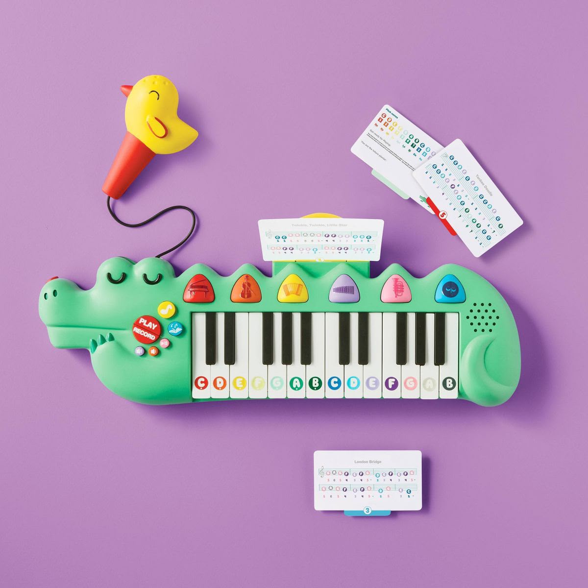 Piano electrónico portátil en forma de cocodrilo